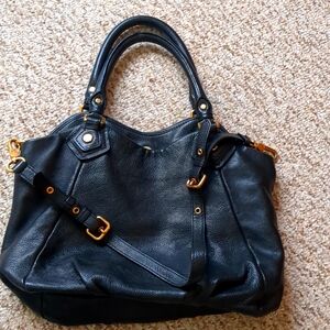 Beautiful soft leather bag with gold hardware.